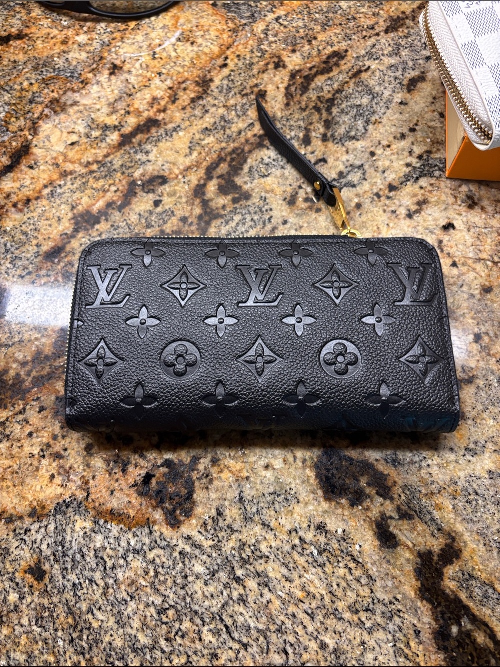 Black Monogram Embossed Zip Wallet with Wrist Strap